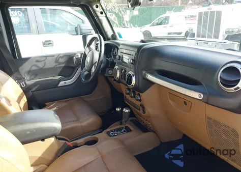 2012 Jeep Wrangler Unlimited Sahara z USA, uszkodzony, nr VIN 1C4HJWEG6CL206063